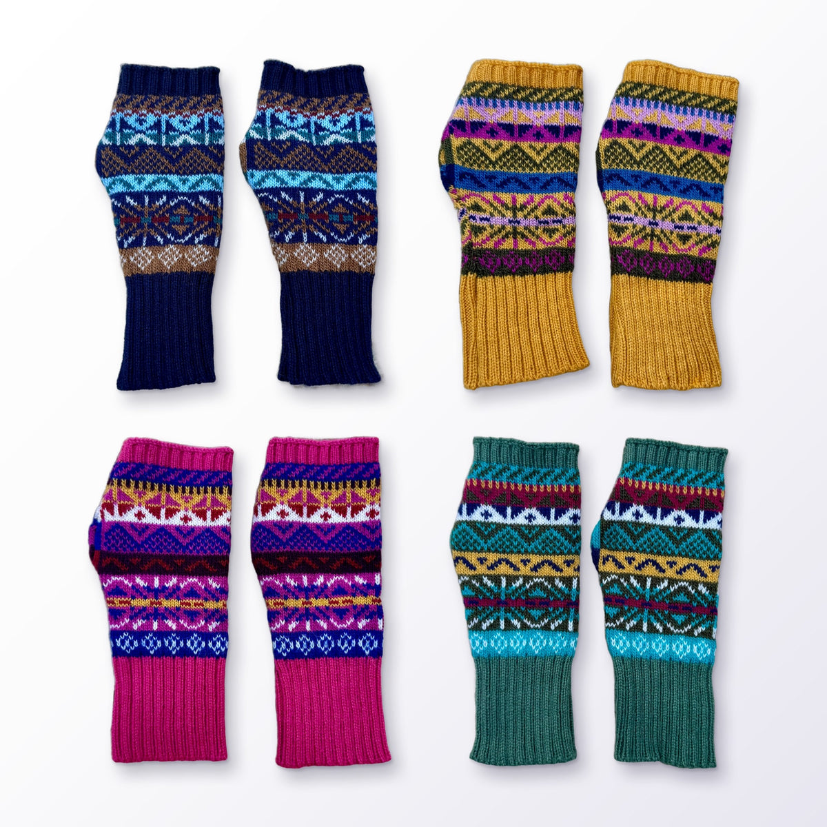 Fair Isle Alpaca Fingerless Gloves in navy, mustard, pink and green on a plain white background