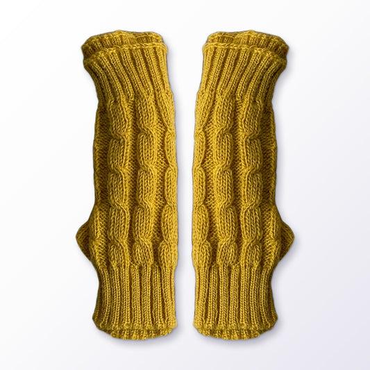 Mustard Cable Knit Alpaca Fingerless Gloves on a plain white background
