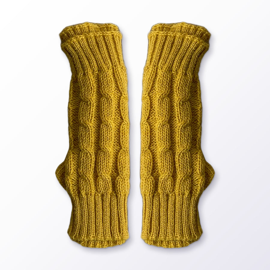 Mustard Cable Knit Alpaca Fingerless Gloves on a plain white background