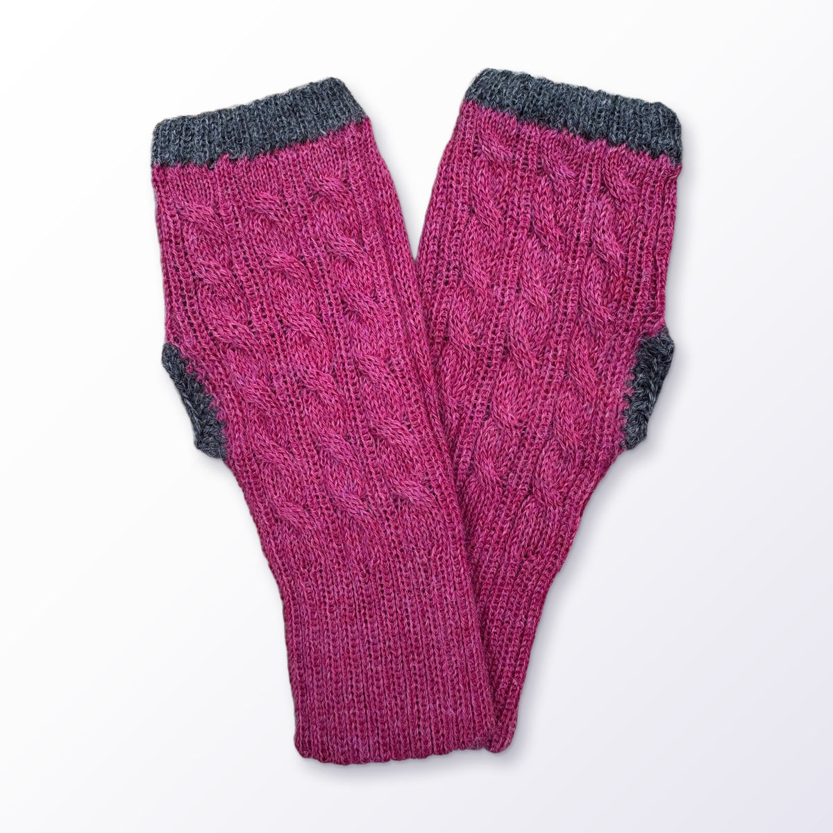 Pink & Grey Reversible Cable Knit Baby Alpaca Fingerless Gloves on a plain white background