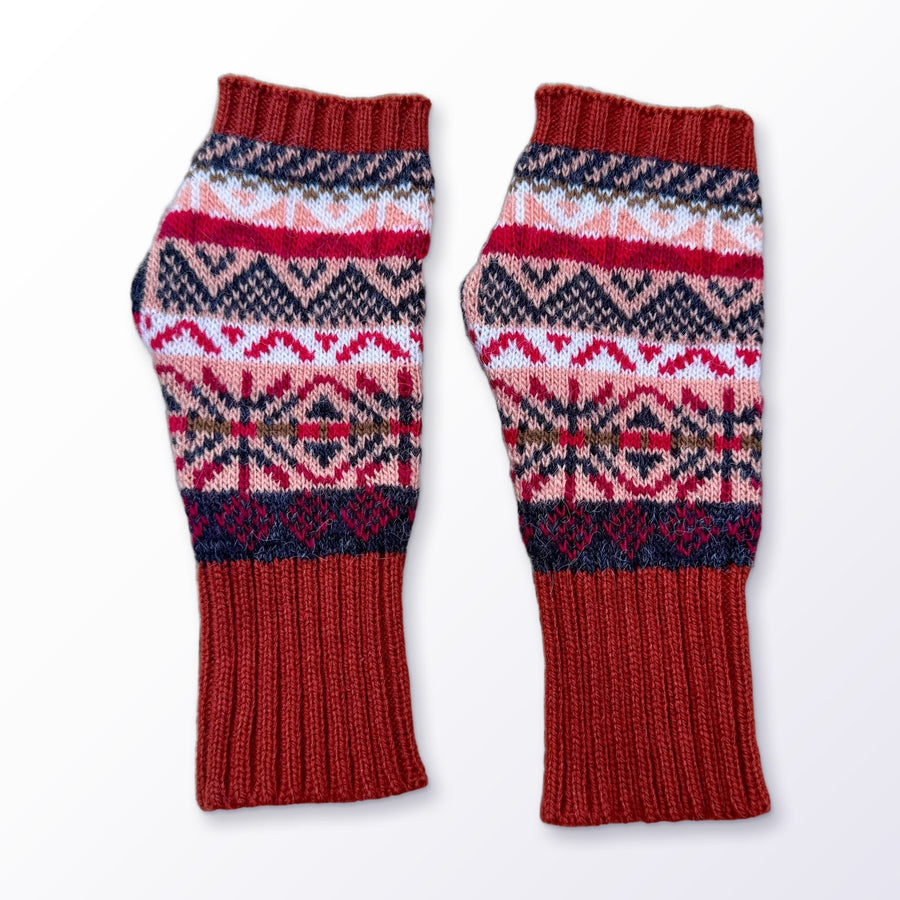 Terracotta Fair Isle Alpaca Fingerless Gloves on a plain white background